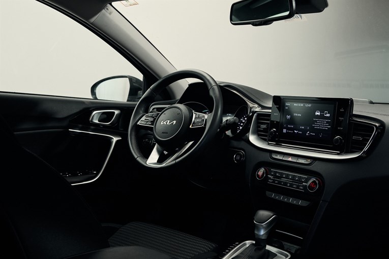 Kia rental car interior and infotainment system.