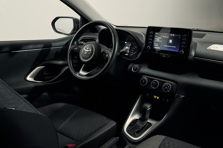 Toyota Yaris interior, steering wheel, dashboard. 