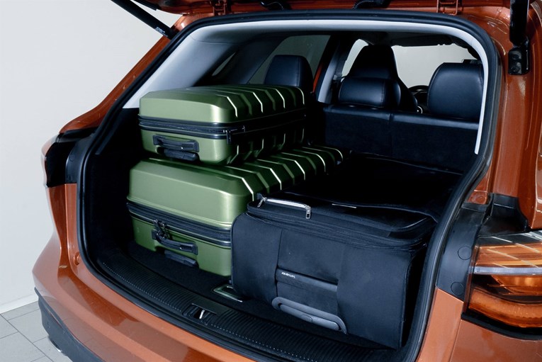 MG EHS open trunk with luggage. 