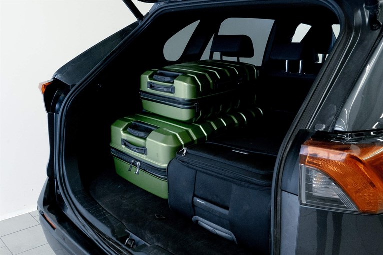 Toyota Rav4  open trunk with luggage.
